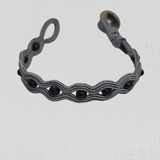 Black Onyx wrapped in dark grey embroidery