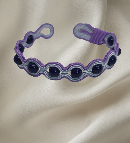 Handmade bracelet with black onyx and purple embroidered detailing – Sir Roberts