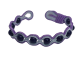 Black Onyx wrapped in purple embroidery