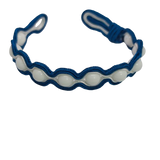 White Agate wrapped in blue embroidery