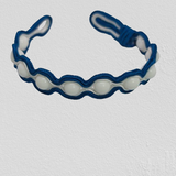 White Agate wrapped in blue embroidery