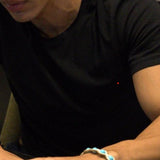 Turquoise Paste wrapped in delicate golden embroidery